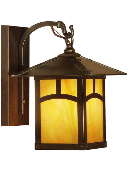 Evergreen Single Sconce with Arch Pattern in Bronze Finish with Gold White Iridescent Glass.